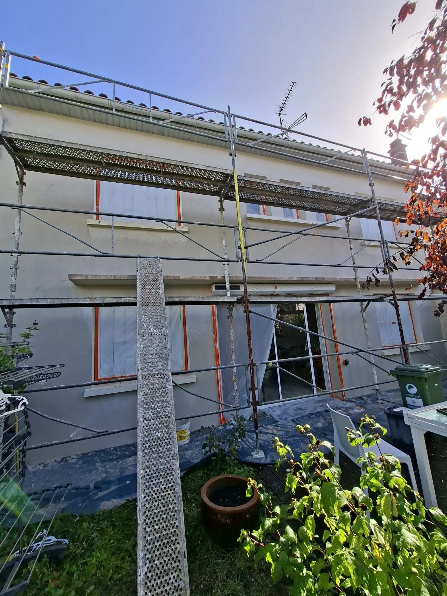 Façade arrière enduite après travaux sur une maison ancienne à Libourne